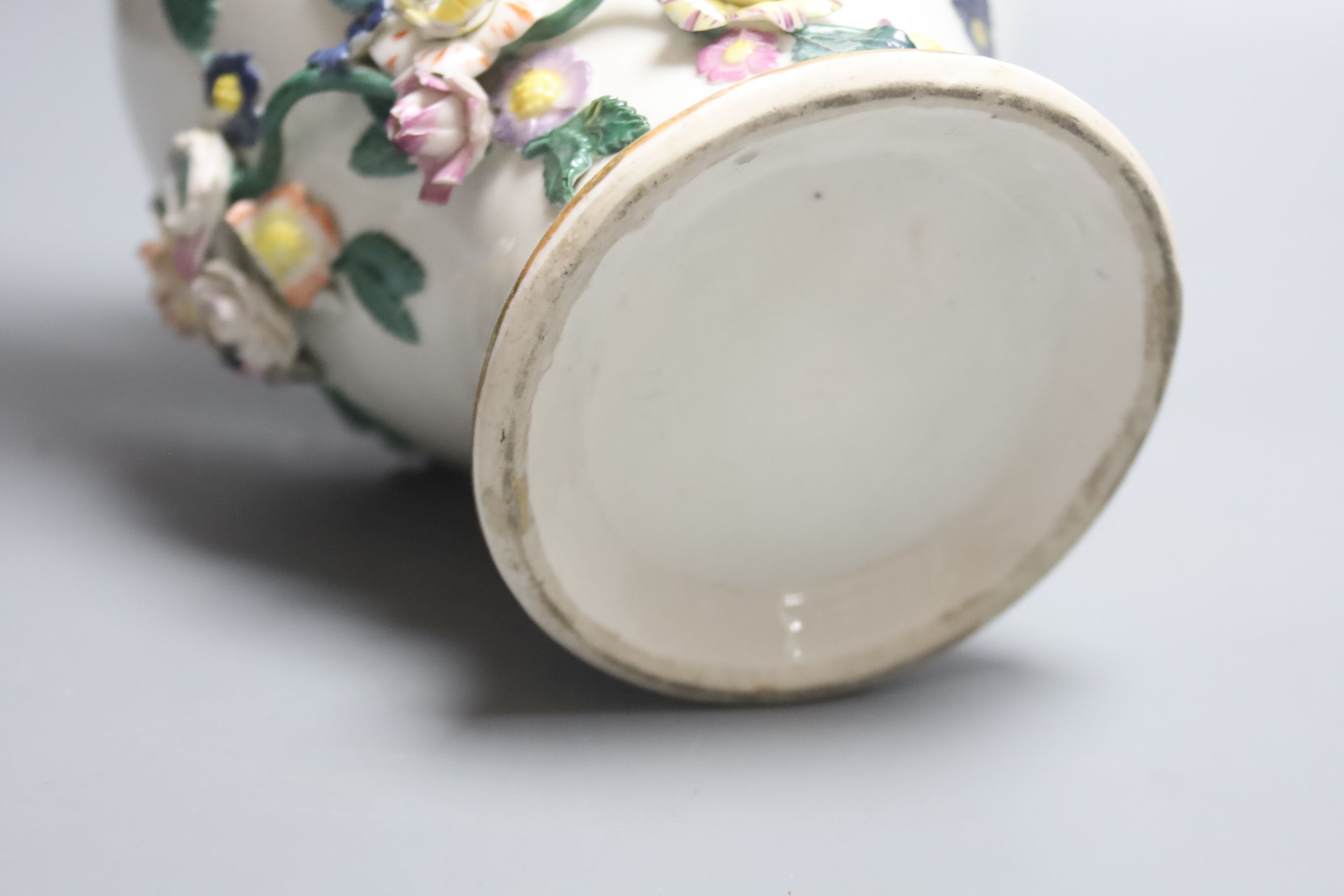 A late 18th century German porcelain pot pourri vase and cover, in Meissen style, height 32cm